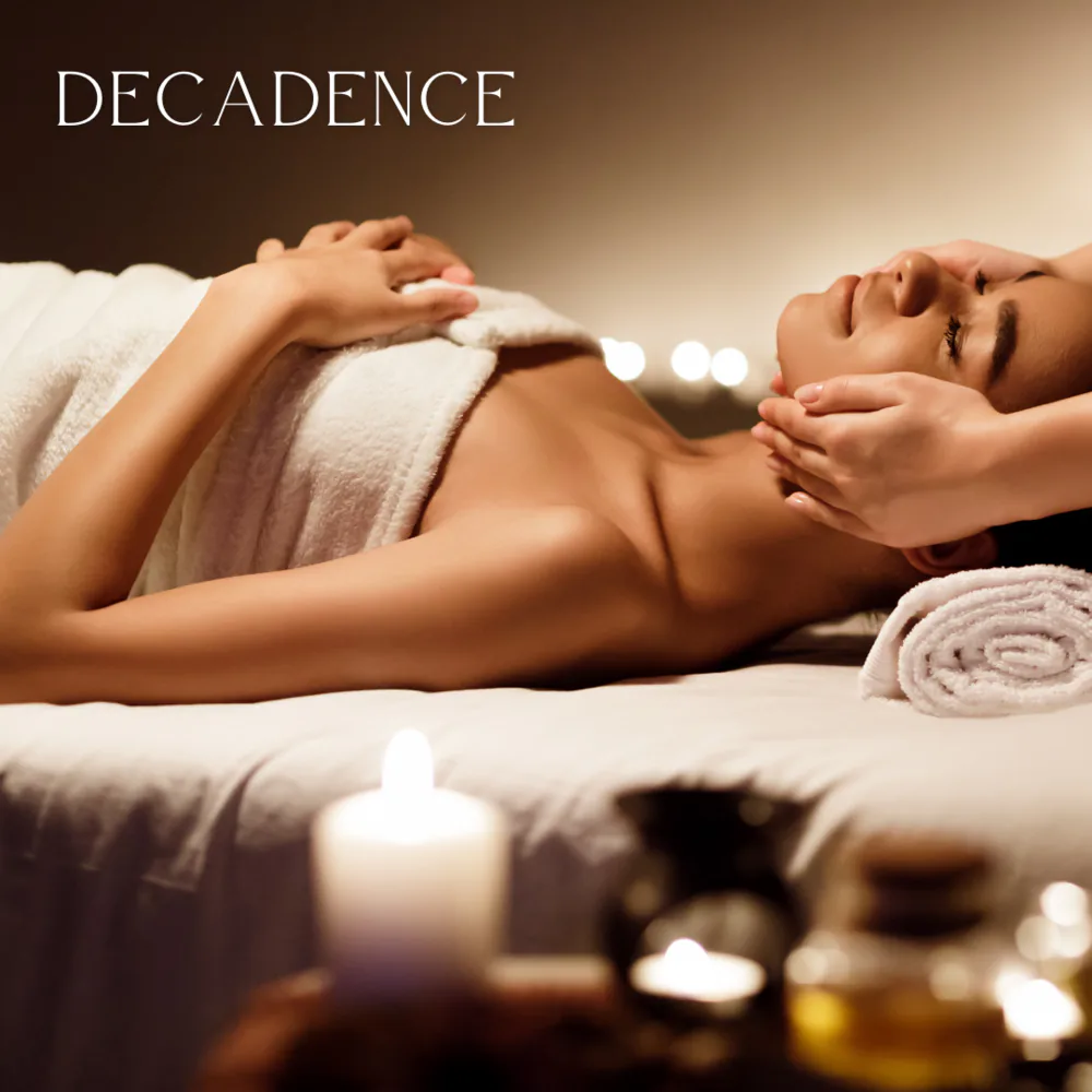 decadence spa package woman relaxing candlelit massage