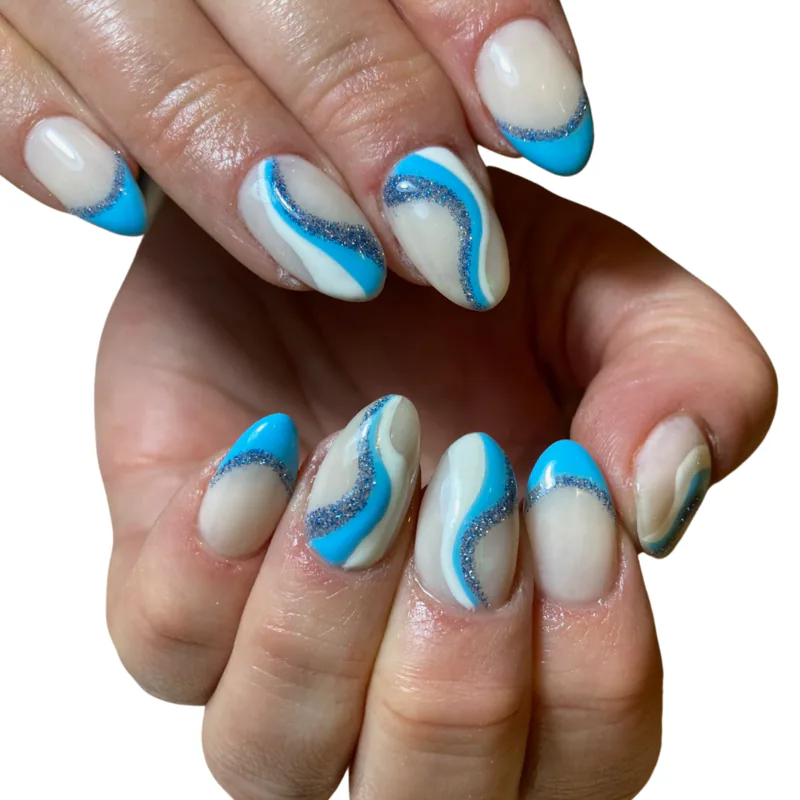 nude nails with blue glitter swirl design